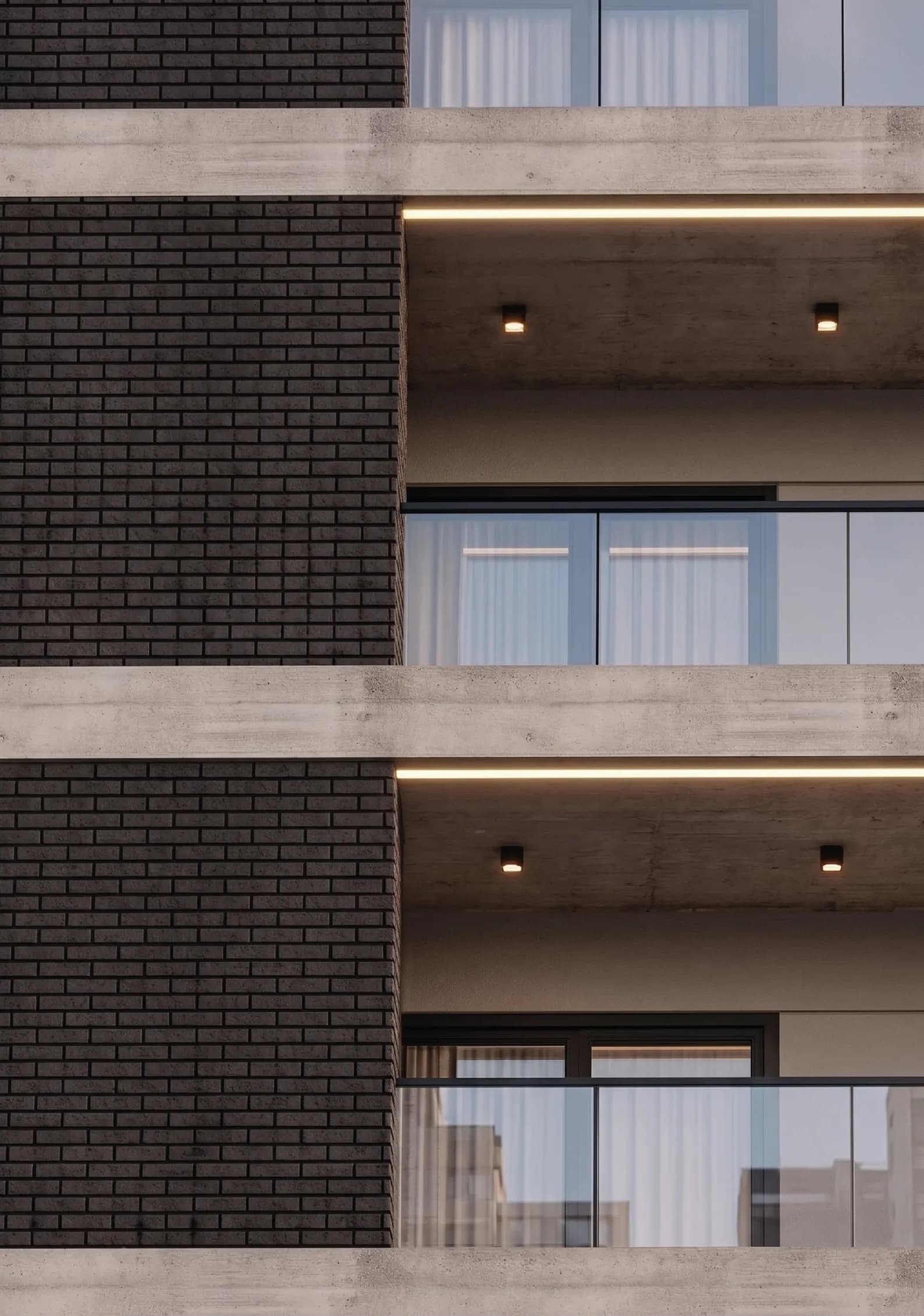 Detalle de los balcones de Lourdes II, con ladrillo oscuro y luz cálida